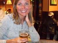 Carly enjoying her beer at Breckenridge Brew Pub!